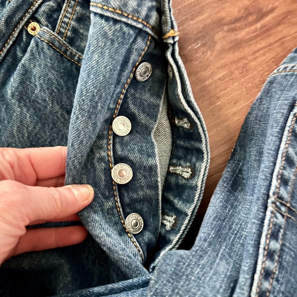 501 button fly Levis and other work jeans